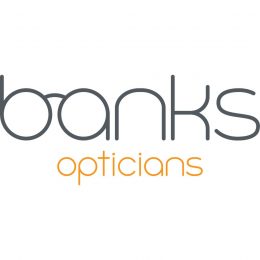 The logo of Banks Opticians. Banks is in a cursive font with the b and a in Banks made to look lie a pair of glass frames.